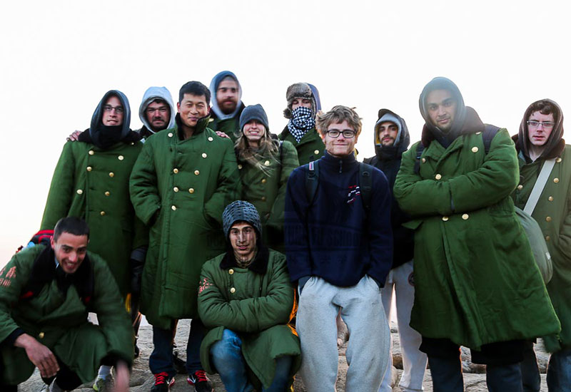 Internatinoal Students In army overcoat